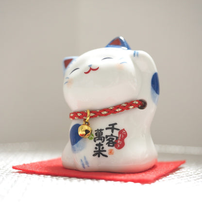 Blue & White Japanese Maneki Neko – Left Paw Raised to Invite People | Yakushigama
