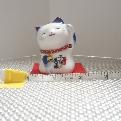 Blue & White Japanese Maneki Neko – Right Paw Raised to Invite Money | Yakushigama