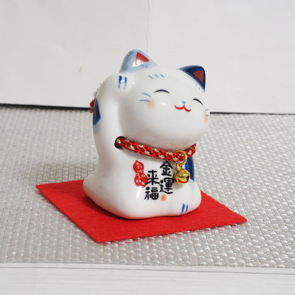 Blue & White Japanese Maneki Neko – Right Paw Raised to Invite Money | Yakushigama