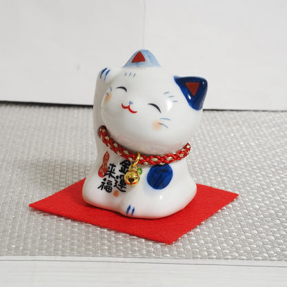 Blue & White Japanese Maneki Neko – Right Paw Raised to Invite Money | Yakushigama